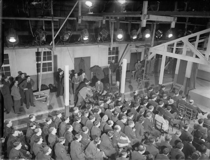 Black-and-white film production scene at Pinewood Studios