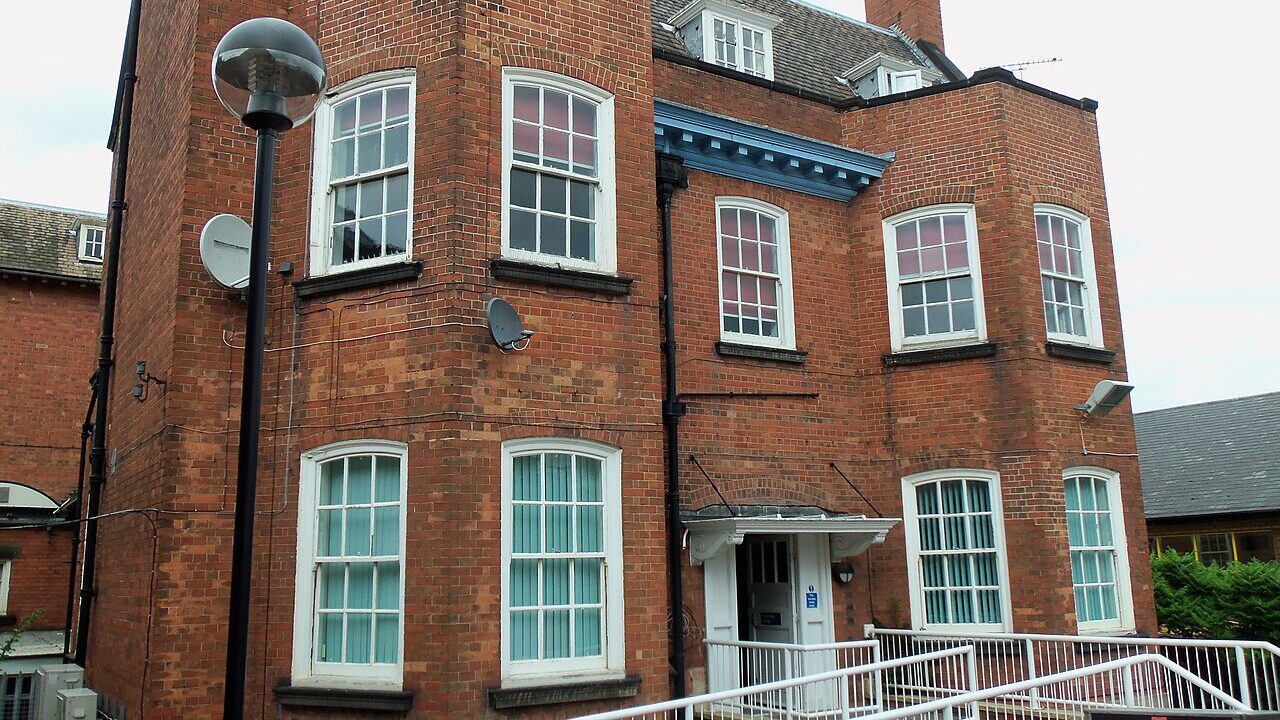 Hospital building exterior in brick and glass