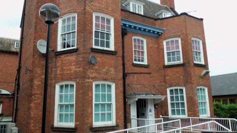Hospital building exterior in brick and glass