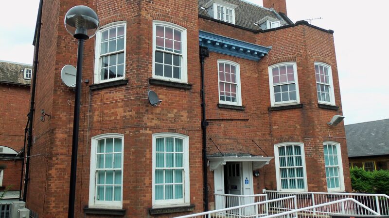 Hospital building exterior in brick and glass