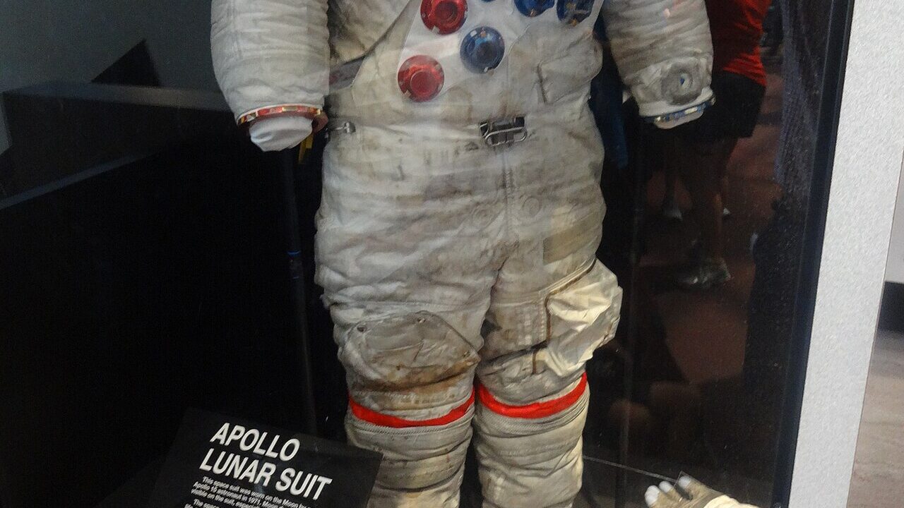 Apollo spacesuit displayed in a museum case