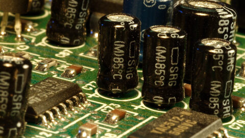Macro view of capacitors and chips on a circuit board