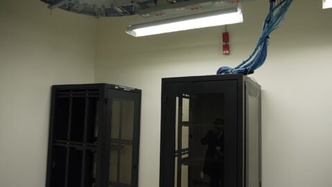 Server racks and cabling in a data centre room