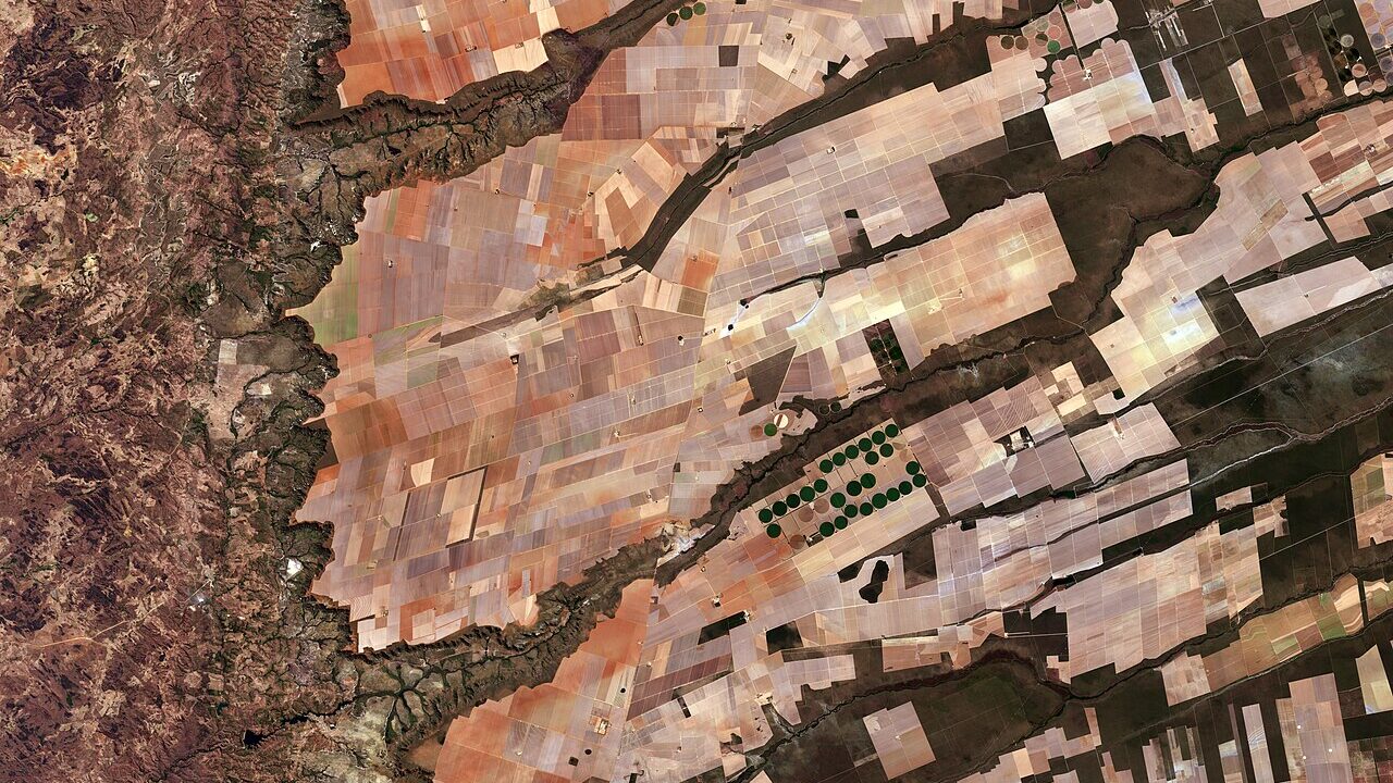 Satellite view of farmland and river patterns in Brazil