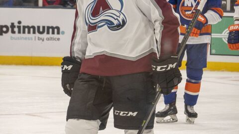 Nathan MacKinnon of the Colorado Avalanche skating on the ice during a game