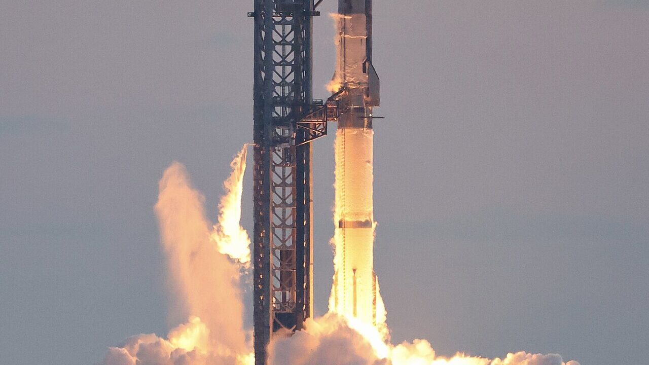 SpaceX Starship rocket igniting during test flight